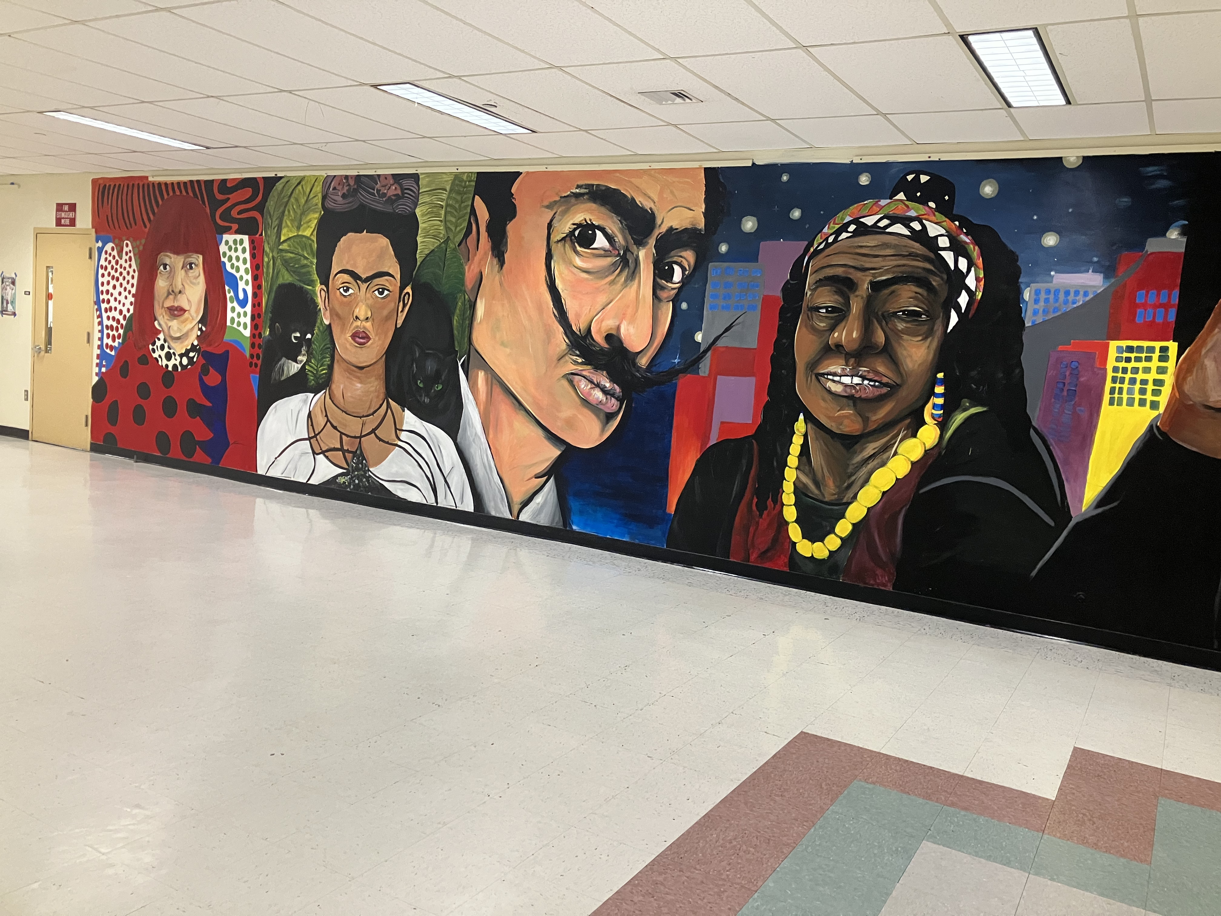 Full view of the Wall of Artists mural at Western High School